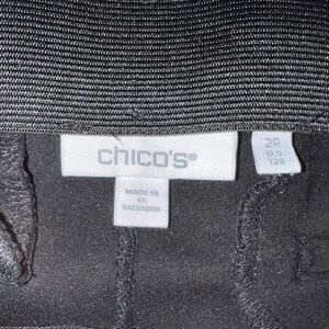 Chico's Elegant Black dress pants with gold button accents on pockets.
